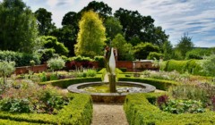 Bignor Park Formal Gardens and pond with sculpture