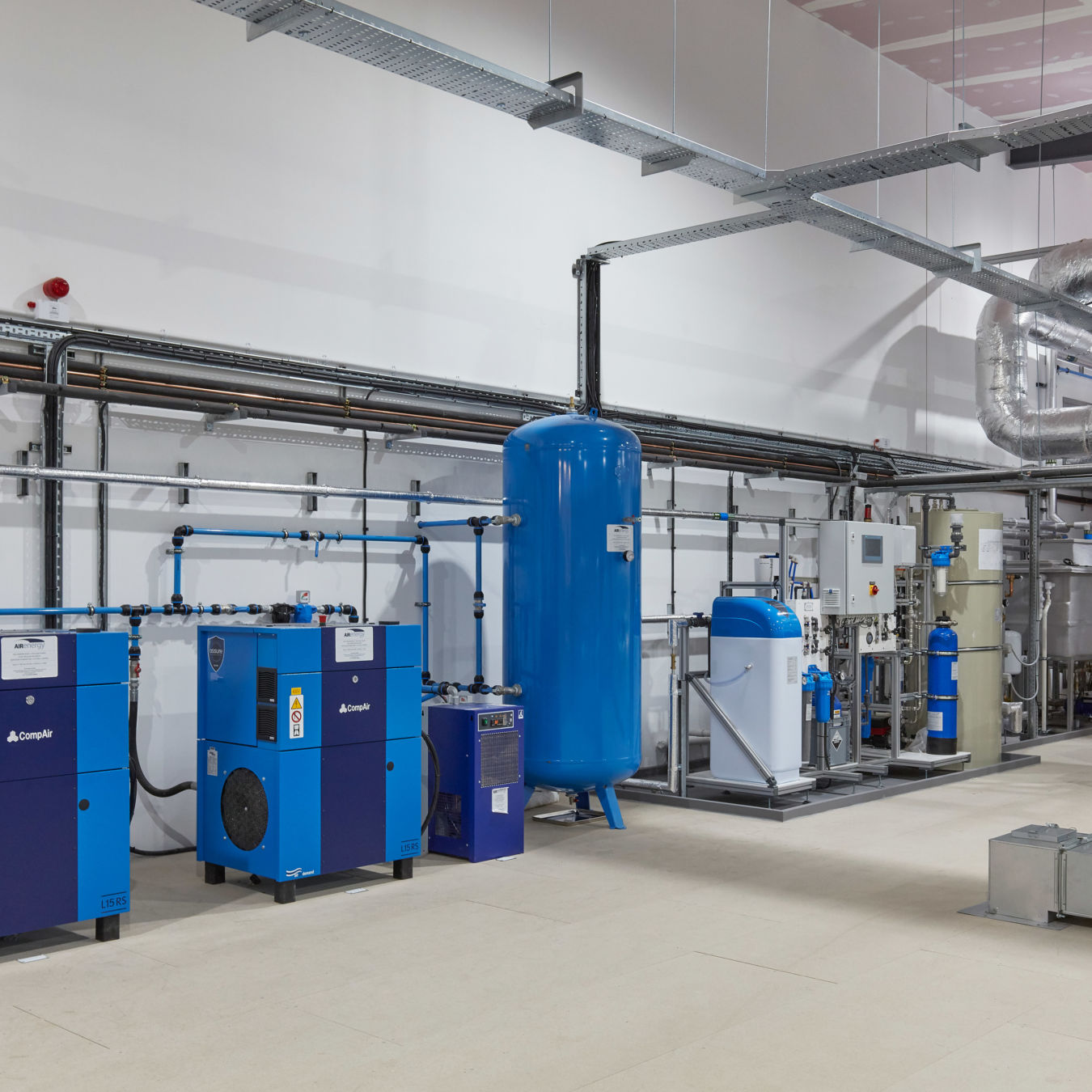 Laboratory utility room with blue industrial gas and water processing equipment, installed as part of a COEL lab infrastructure project for Sense Bio.