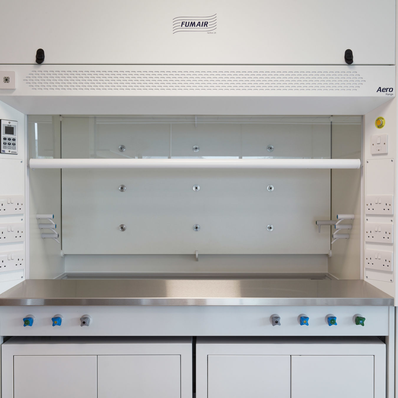 Laboratory fume hood with integrated controls and storage cabinets, installed as part of a COEL Lab Planning project.