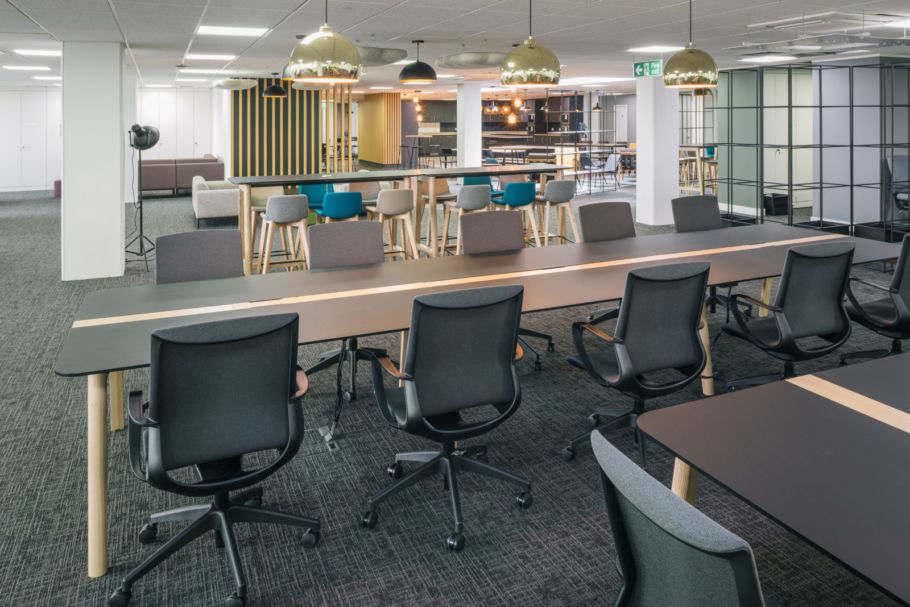 meeting area in the Archant Norwich office featuring a long lexicon table with chairs